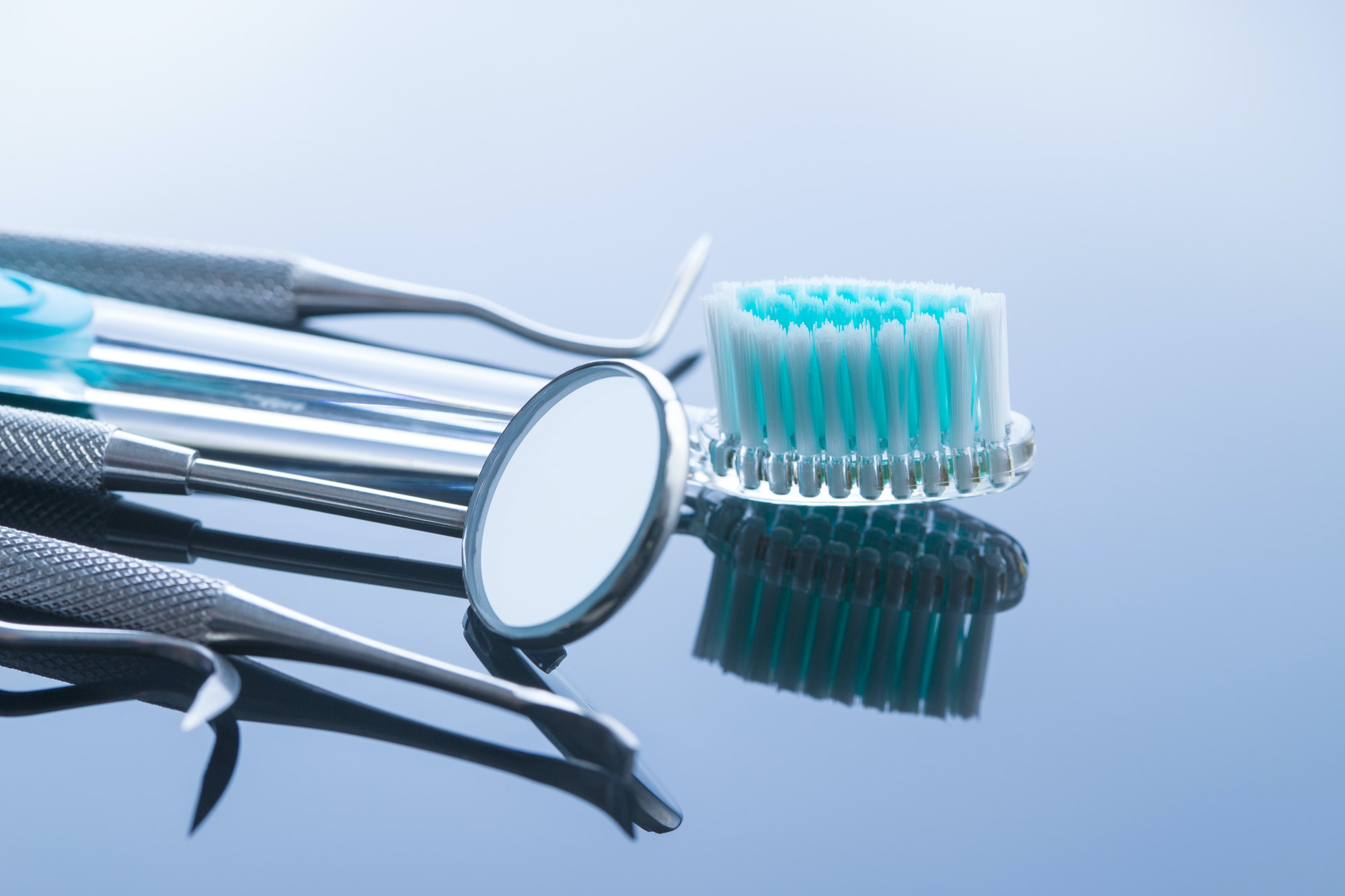 Dental instruments. Dentists tools and toothbrush.
